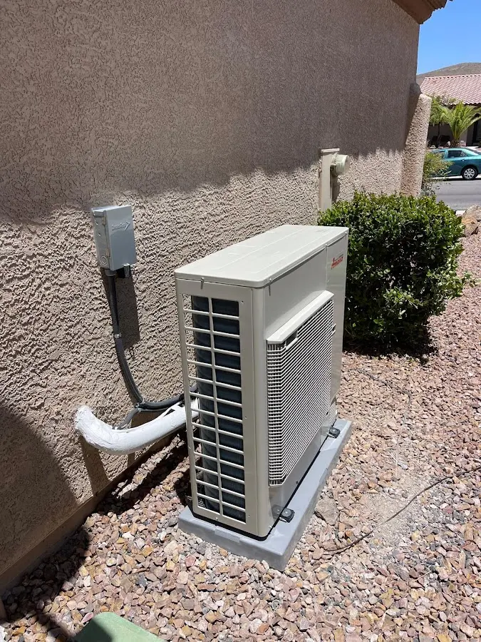 Residential air conditioning condenser unit in Tracy