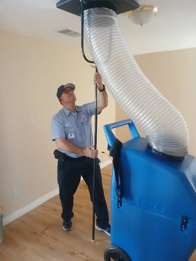 HVAC Installation technician using HEPA equipment in Tracy